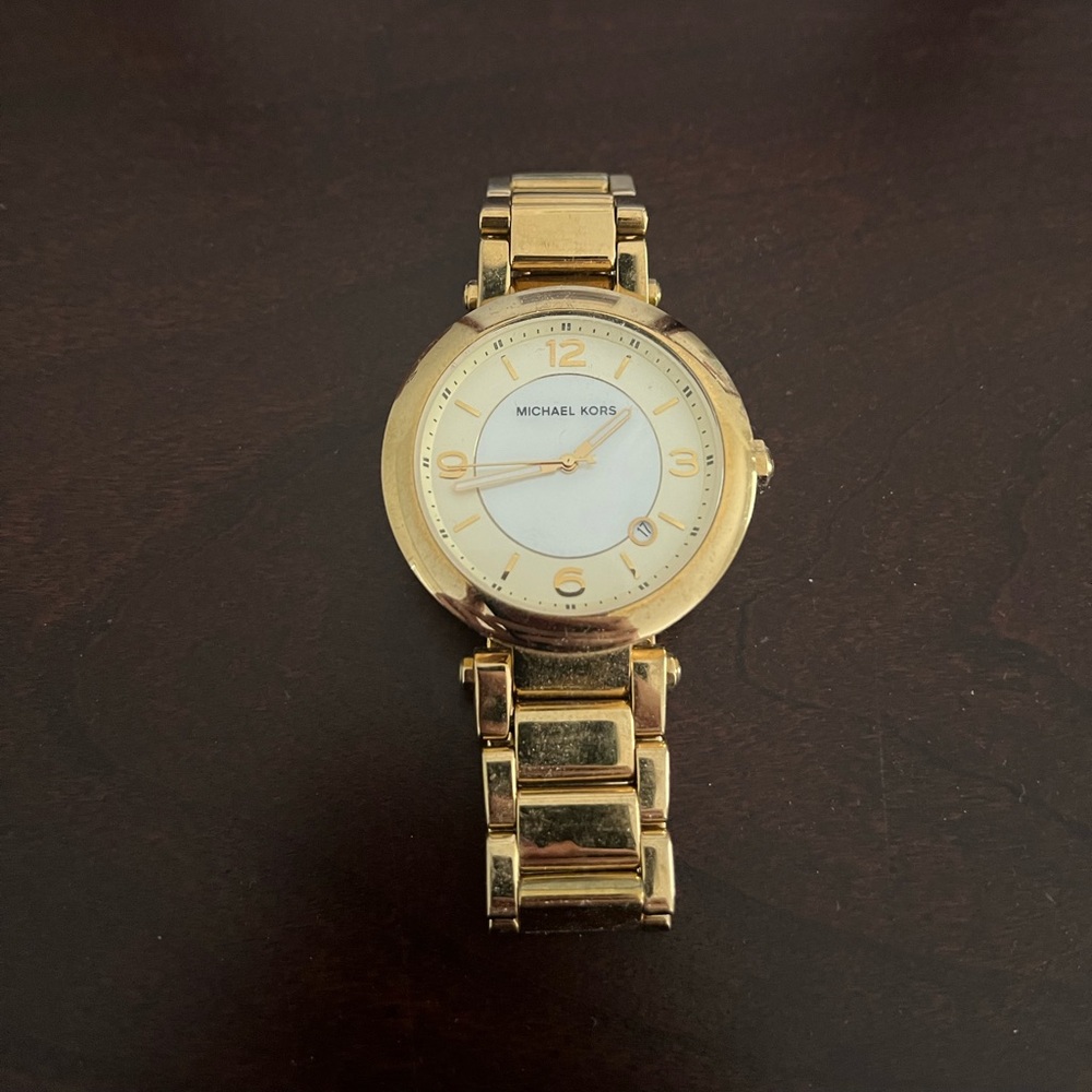 Michael Kors women’s gold watch